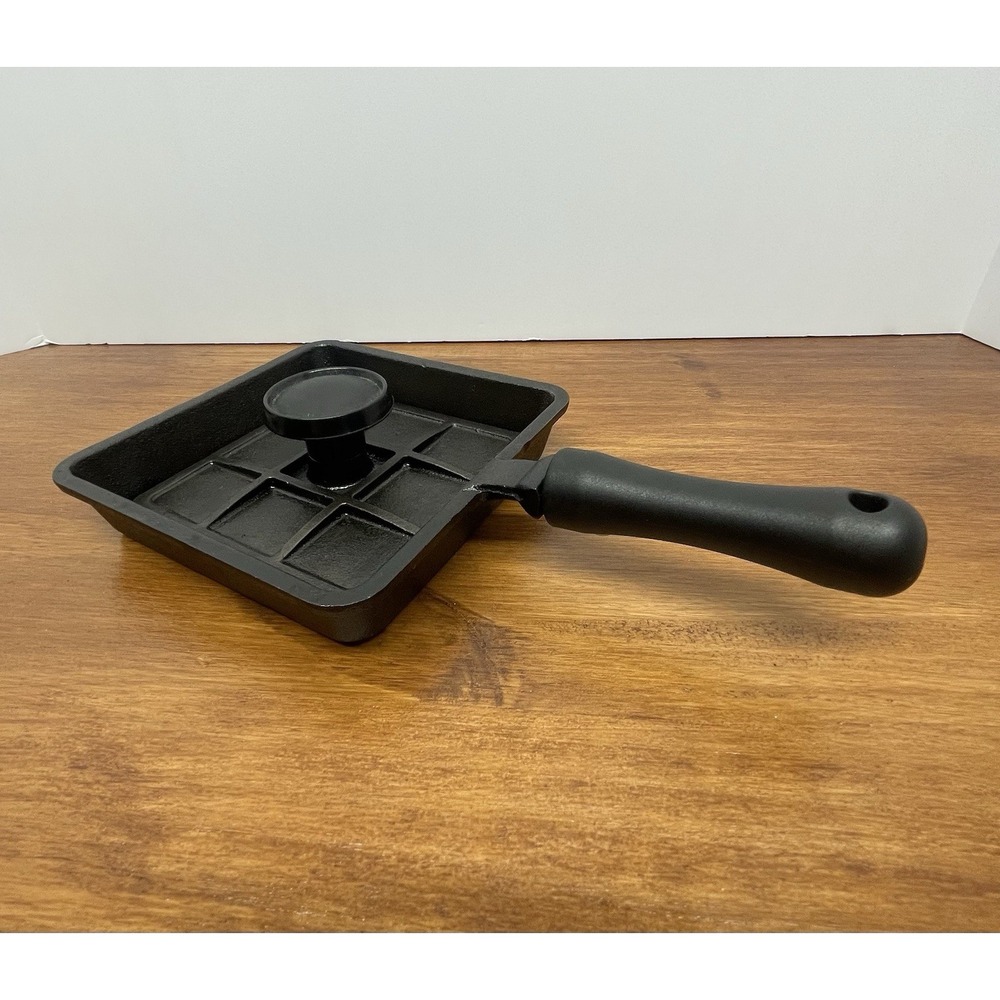 The Norpro Mini Cast Iron Panini Pan with Press, a 5.9-inch Model 653